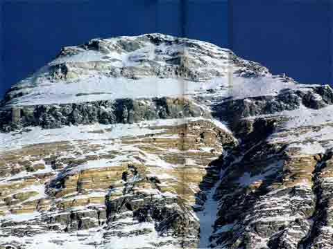 
Colin  Monteith photo of the summit area of Everest on Oct 3, 1984, showing the upper part of the Hornbein Couloir. Tim McCartney-Snape and Greg Mortimer are miniscule red figures just below the Everest summit. - Himalaya Alpine Style: The Most Challenging Routes on the Highest Peaks book
